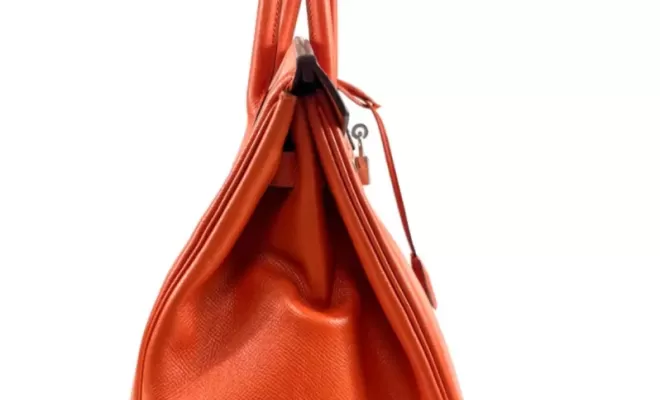 Hermès, Sac "Birkin" en veau Epsom orange.