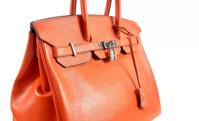 Hermès, Sac "Birkin" en veau Epsom orange.