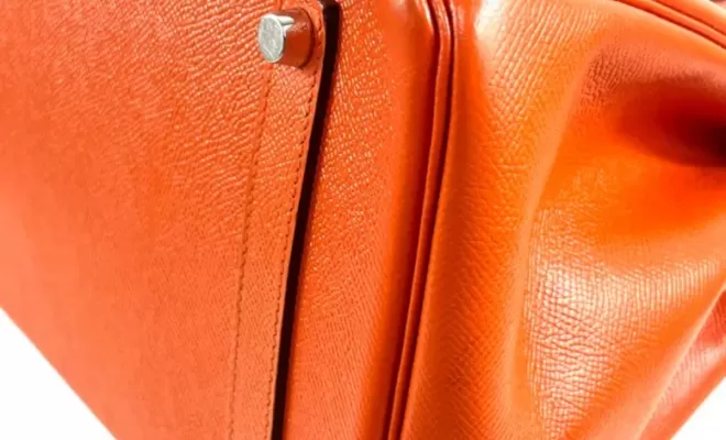 Hermès, Sac "Birkin" en veau Epsom orange.