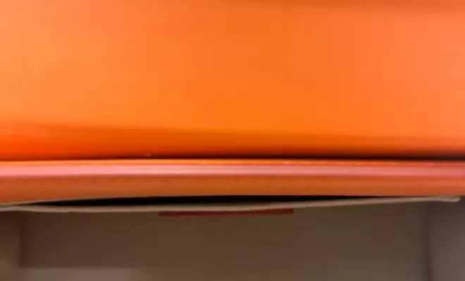 Hermès, Sac "Birkin" en veau Epsom orange.